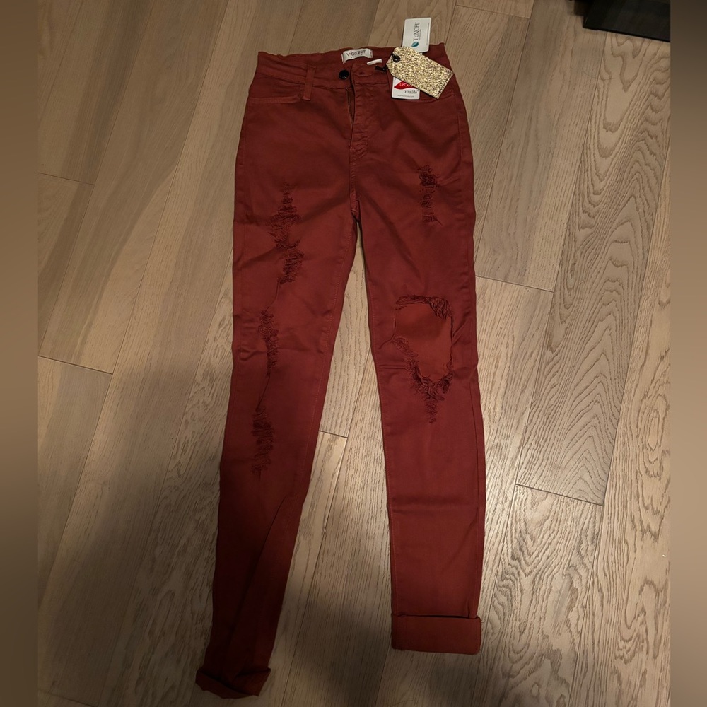 Burnt orange ripped denim